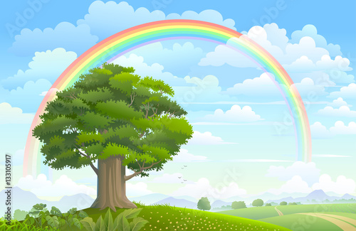 A majestic tree under a beautiful rainbow