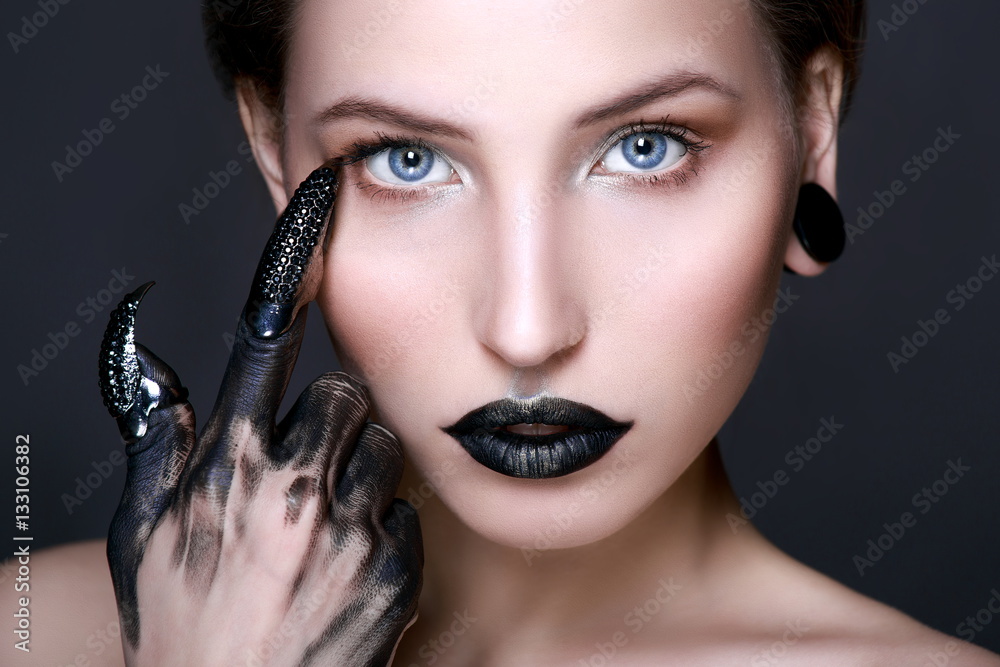 Black lips. Halloween Makeup. Luxury beautiful woman with dark lipstick and  claws. Beauty stylish girl Stock Photo | Adobe Stock