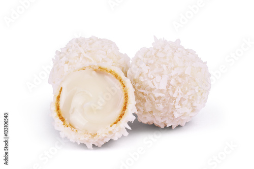 White Chocolate Candy With Coconut Topping On White Background photo