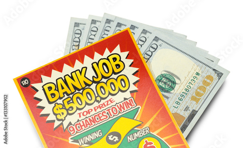 Scratch Off Lotto Ticket and Cash Close Up