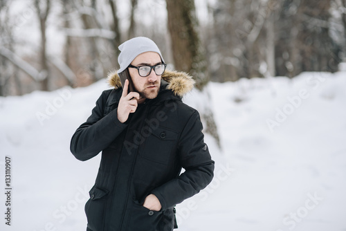 Happy young man with beard.