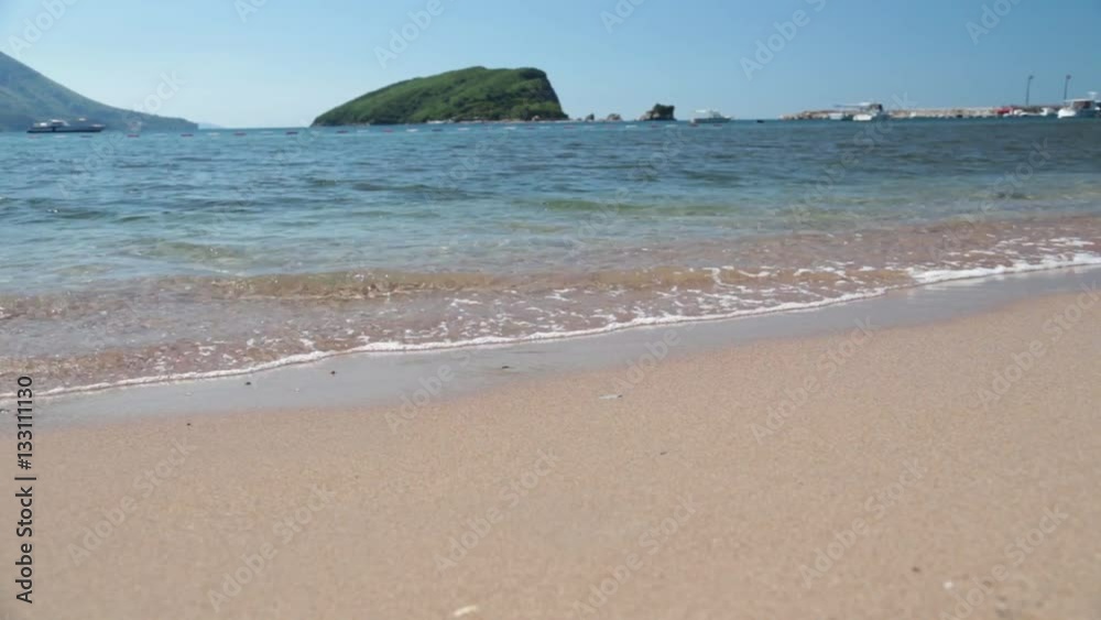 The sea and the coastline, Budva, Montenegro, Adriatic Sea, Mediterranean Sea..Sea beach with waves. Beautiful sea wave. Relaxation. An empty sea beach. Sea waves. Sea waves near the beach. The sea and the coastline, Budva, Montenegro, Adriatic Sea, Mediterranean Sea..Sea beach with waves. Beautiful sea wave. Relaxation. An empty sea beach. Sea waves. Sea waves near the beach.
