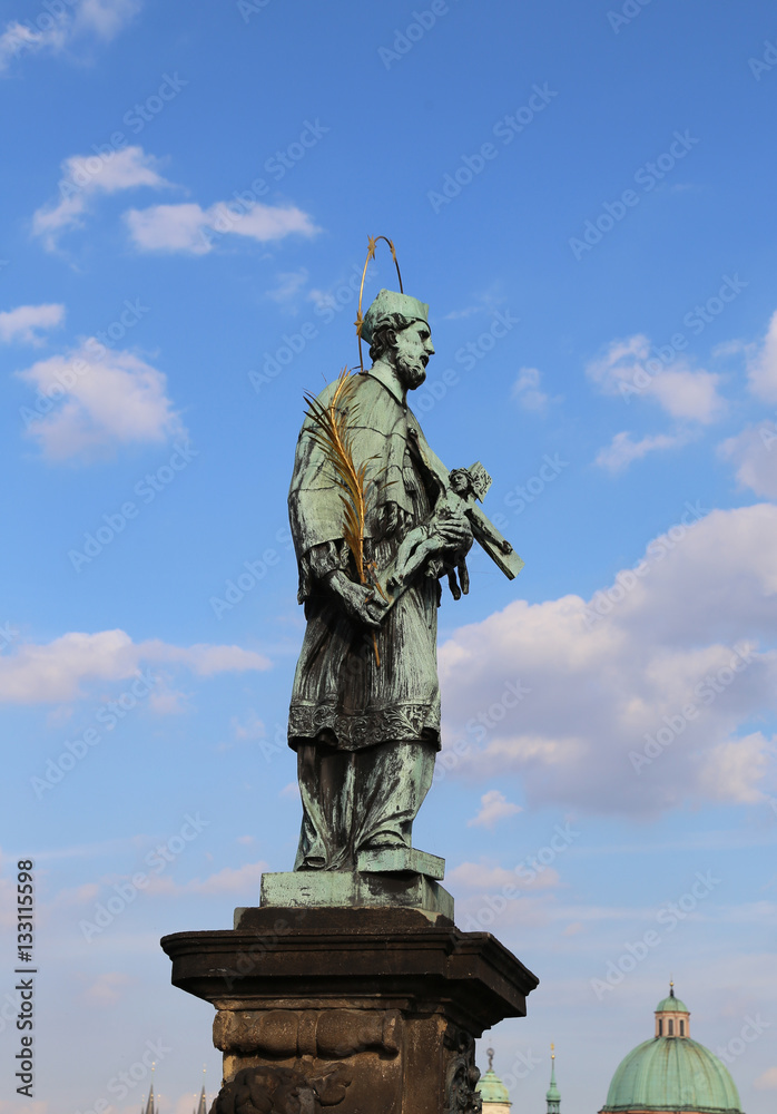 statue of John of Nepomuk at Charles Bridge in Prague