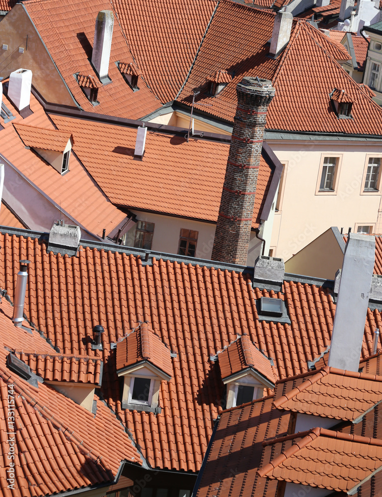 many tiles on the roofs of the houses