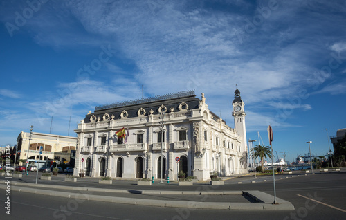 Port Authority buildings with clock tower in Valencia harbor, Spain, wide angle