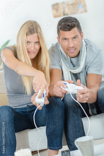 couple playing video games photo
