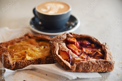 Fruit filled pastries and coffee  photo