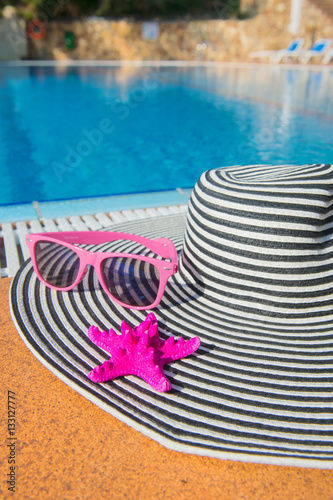 Summer hat at the swimming pool