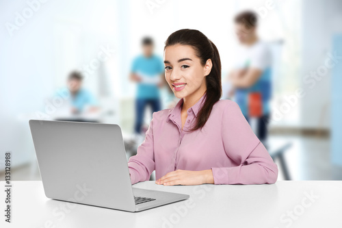 Young businesswoman working...