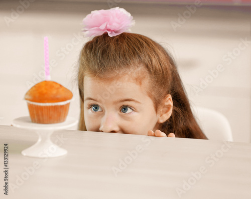Cute little girl with birth...