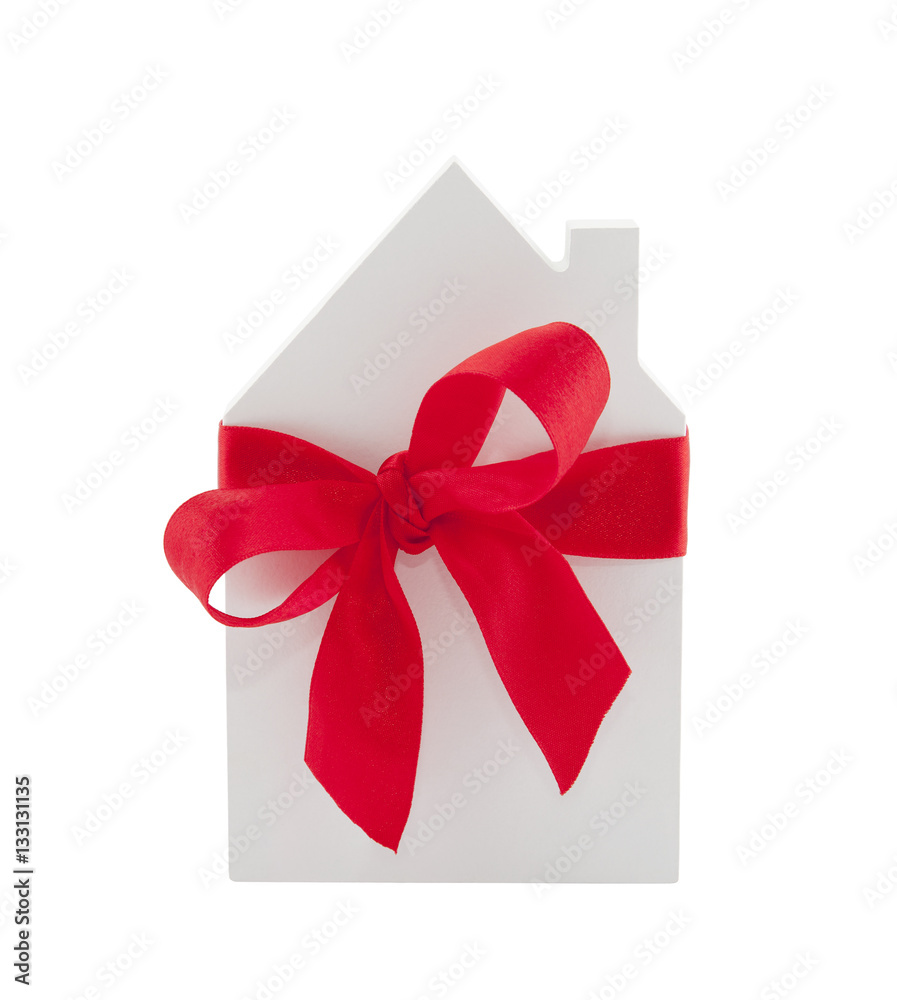 House with red ribbon isolated on white background with clipping path