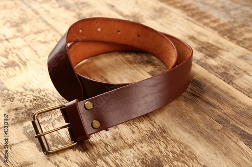 Stylish leather belt on woo...