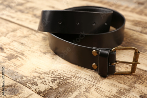 Stylish leather belt on woo...