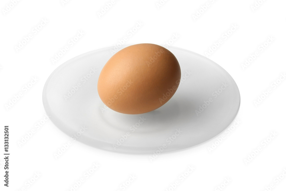 Raw egg in plate on white background Raw egg in plate on white background