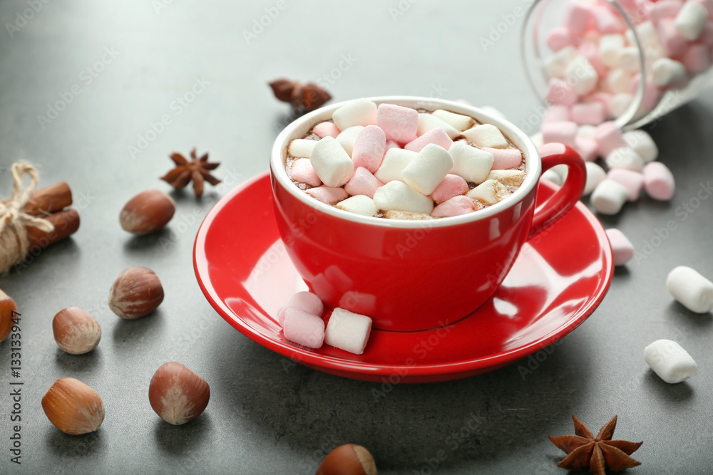 Cup of hot cocoa with marshmallows on color background Cup of hot cocoa with marshmallows on color background