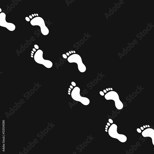 Fingerprints, traces of feet on a black background