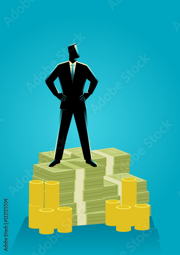 Businessman standing on money