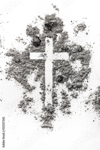 Christian cross made in ash, dust as religion concept background