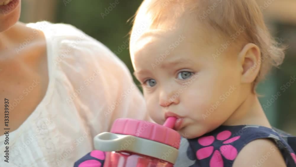 mom keeps on hands a little baby girl mom keeps on hands a little baby girl