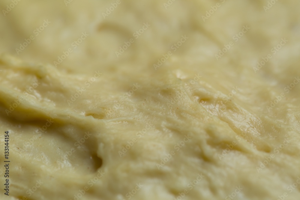 Raw yeast cake growing in bowl Raw yeast cake growing in bowl