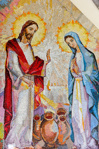 MEDJUGORJE, BOSNIA AND HERZEGOVINA, 2016/08/16. Mosaic of the wedding of Cana of Galilee where Jesus Christ worked his first miracle on the intercession of His Mother Mary. The second Luminous mystery