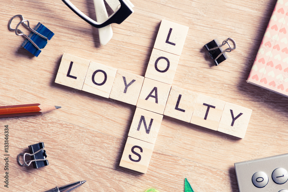 Conceptual business keywords on table with elements of game making crossword Conceptual business keywords on table with elements of game making crossword