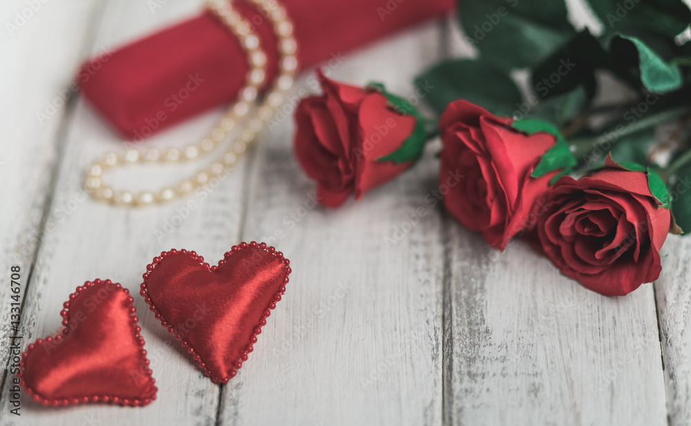 Roses and hearts on old wooden board, Valentines Day background, wedding day Roses and hearts on old wooden board, Valentines Day background, wedding day