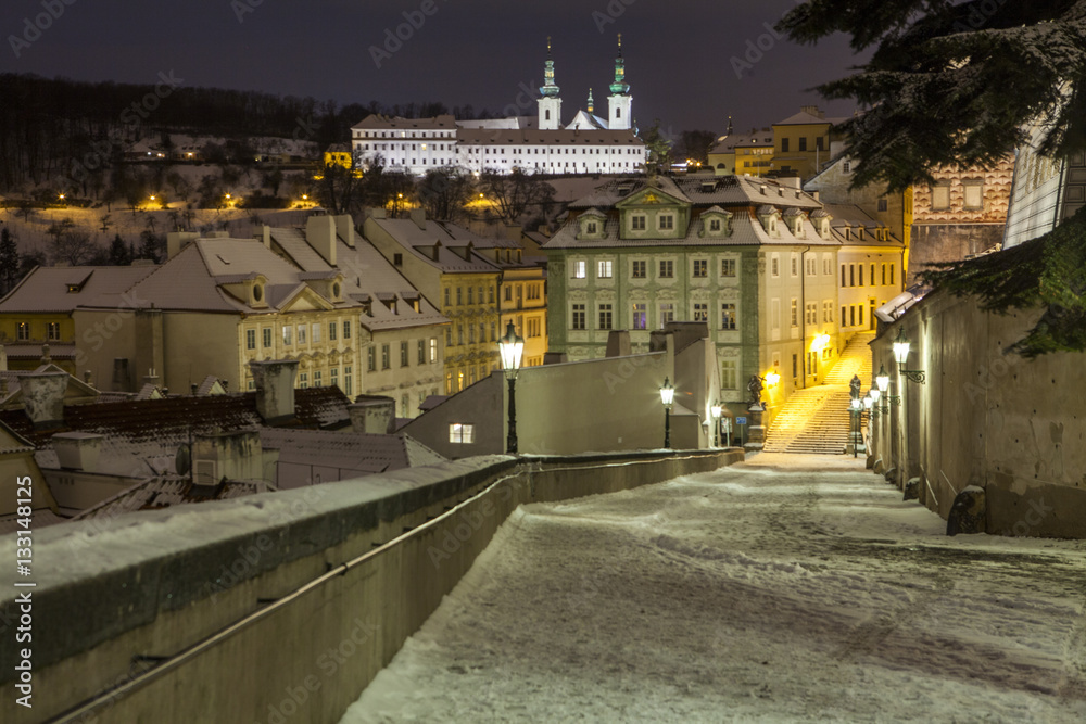  Winter in Prague, beautiful snow evening, view from the heights of Prague Castle 