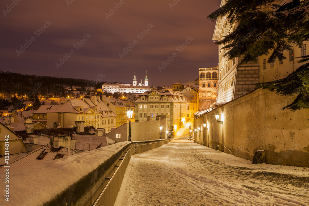  Winter in Prague, beautiful snow evening, view from the heights of Prague Castle 
 Winter in Prague, beautiful snow evening, view from the heights of Prague Castle 
