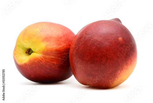 two peaches isolated on white background