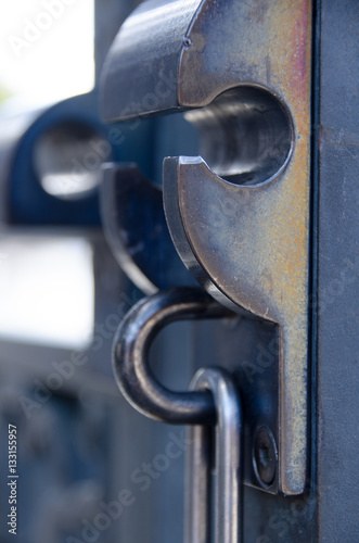 closeup of old lock on metal door