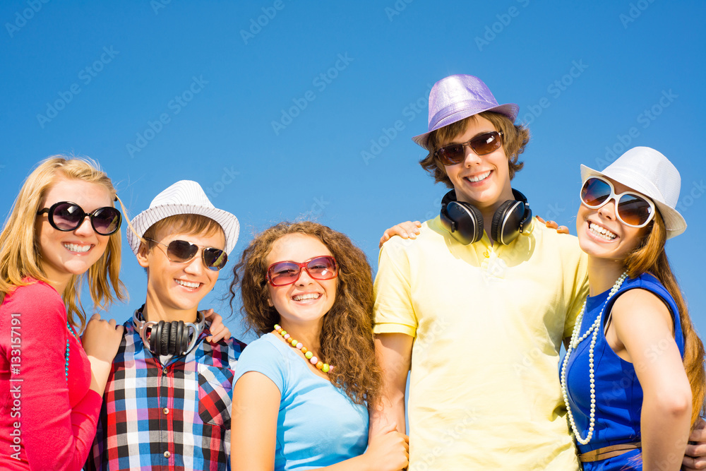 group of young people wearing sunglasses and hat group of young people wearing sunglasses and hat