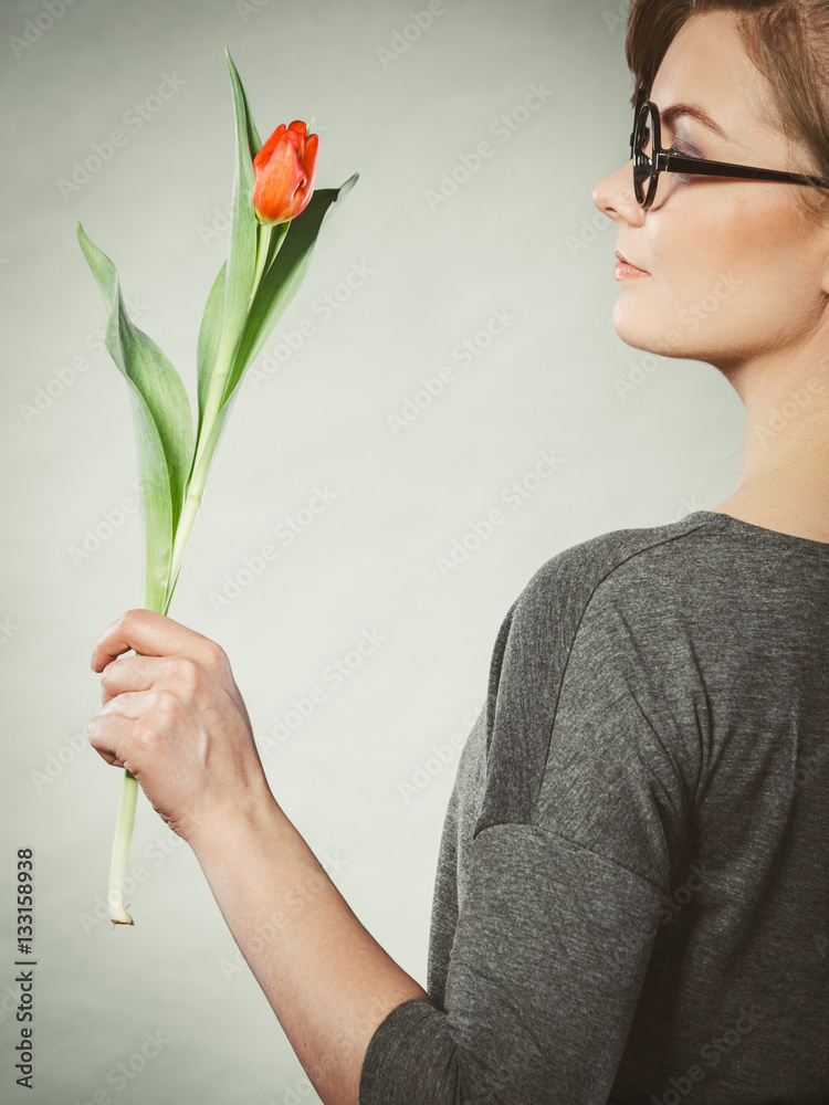 Elegant woman with flower.