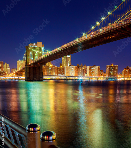 Brooklyn Bridge at dusk viewed from New York City.
