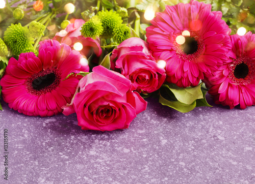 Beautiful pink roses and gerberas