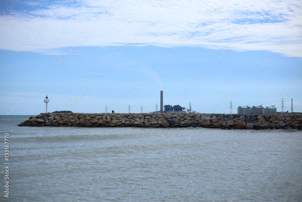 Rock breakwater and Blue sky in Rayong at Thailand