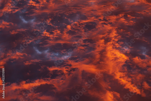 Colorful Heavenly Orange Warm Clouds On Sky at Sunset
