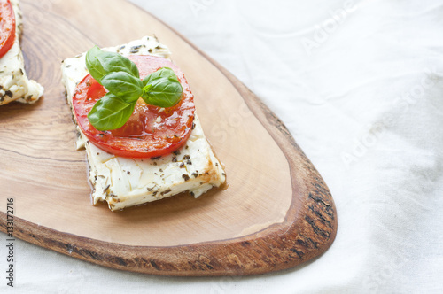 Roasted feta with tomatoes