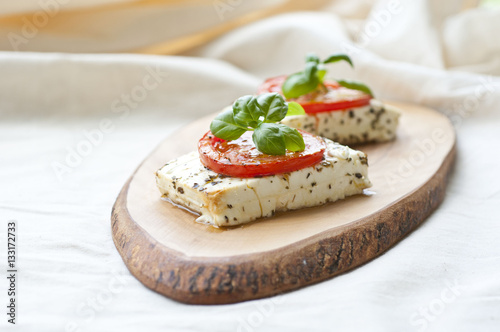 Roasted feta with tomatoes