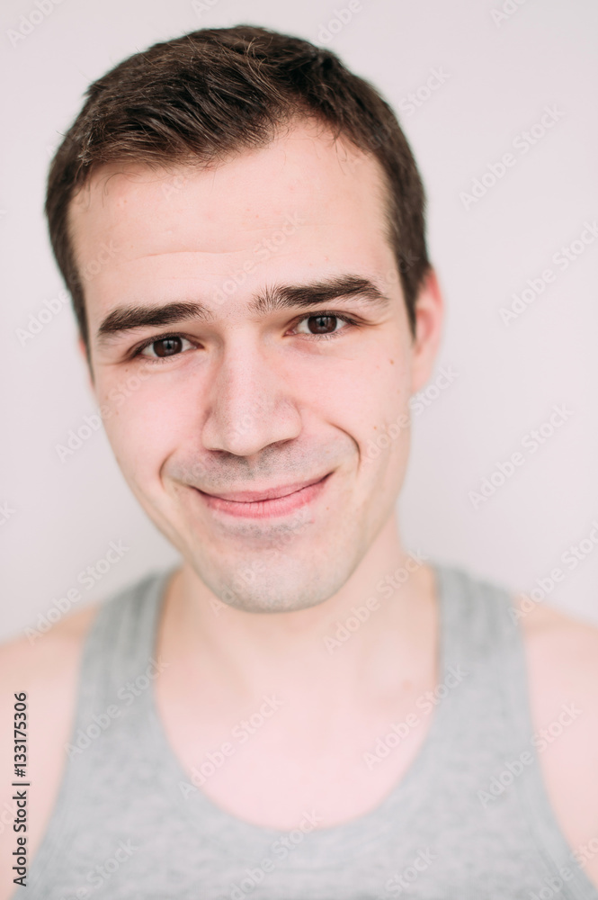 Close up portrait of a handsome young man on white Close up portrait of a handsome young man on white