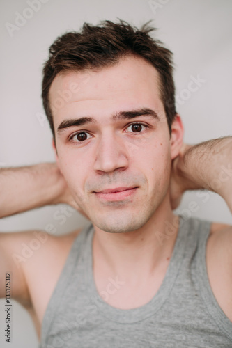 Close up portrait of a handsome young man on white