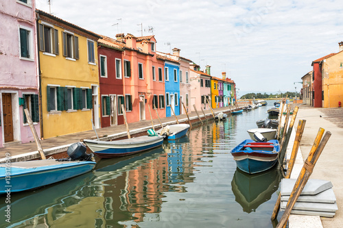 Colorful houses lining the canal (Burano, Italy) © frank11