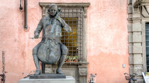 Lucca, Italy - September 04, 2014: Statue of Composer and Cellist Luigi Boccherini at famous Music Academy, Lucca, Tuscany, Italy
