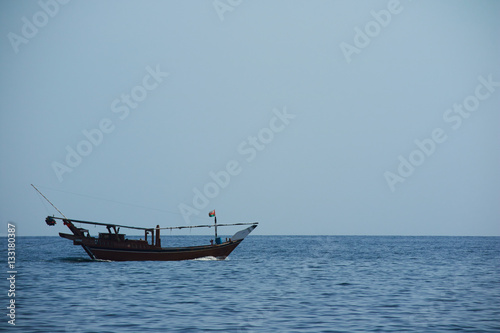 Oman boat in the sea Mountain