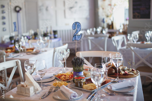 Dining table setting at Provence style  with candles  lavender 