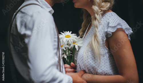 Boy and girl holding hands. Romantic love story