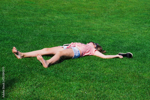 little girl on the grass