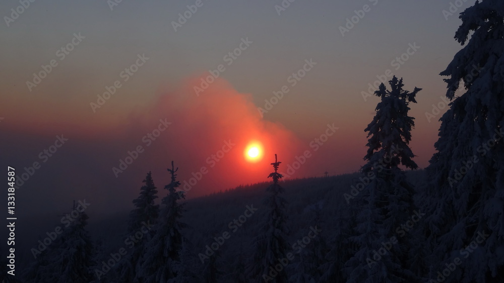 Fototapeta premium Colorful landscape at the winter sunrise in the mountain forest. Winter view from Jested