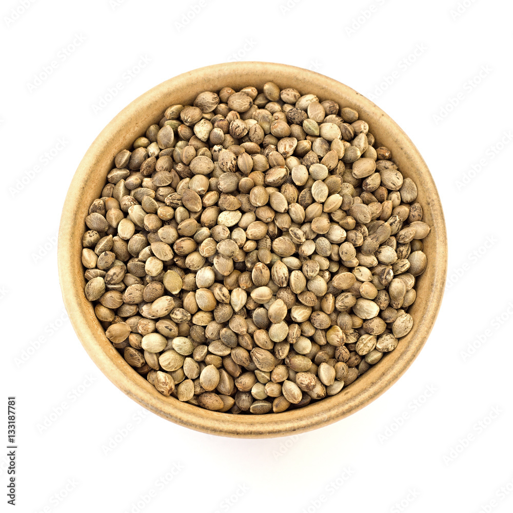 hemp seed in a bowl on a white background
