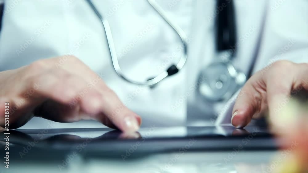 Doctor Woman Using Digital Tablet. Close Up Doctor Woman Using Digital Tablet. Close Up